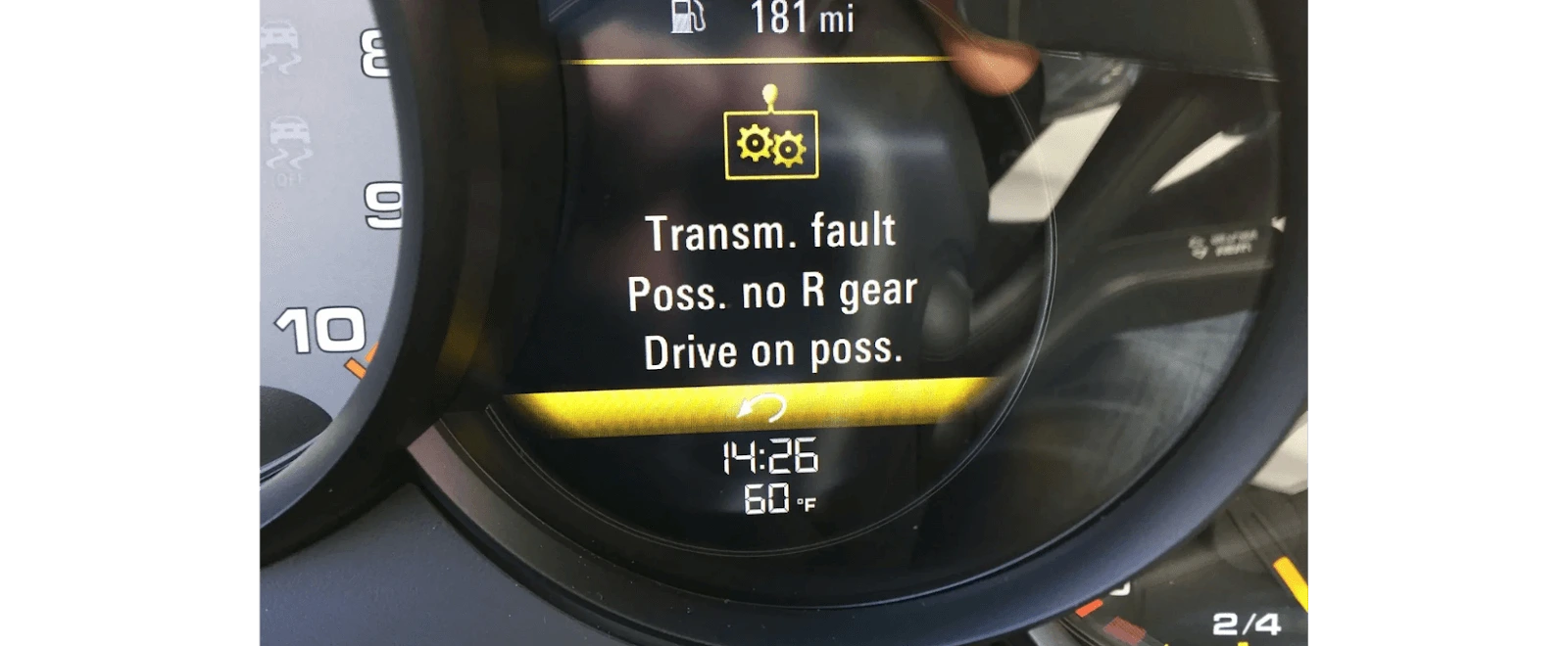 Porsche dashboard displaying warning lights indicating transmission faults. Owner must consult a Porsche service in Jacksonville.