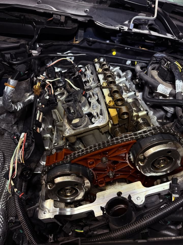 320i in for a brake flush & a valve cover